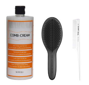 Apply a rich layer of 'Comb Cream' to the dry hair